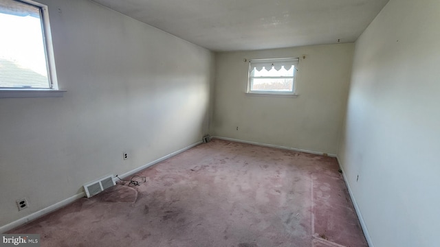 view of carpeted spare room