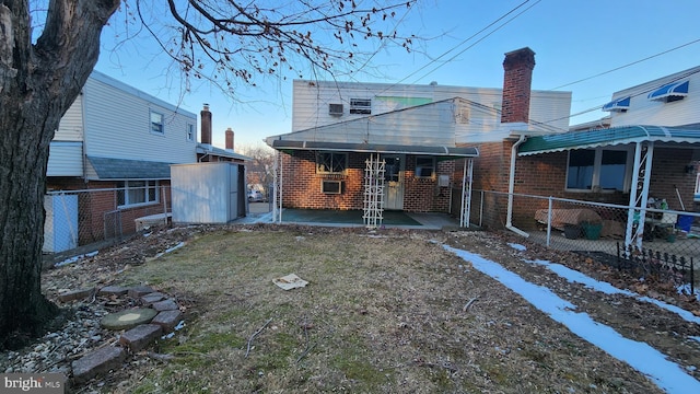 rear view of house featuring a patio area