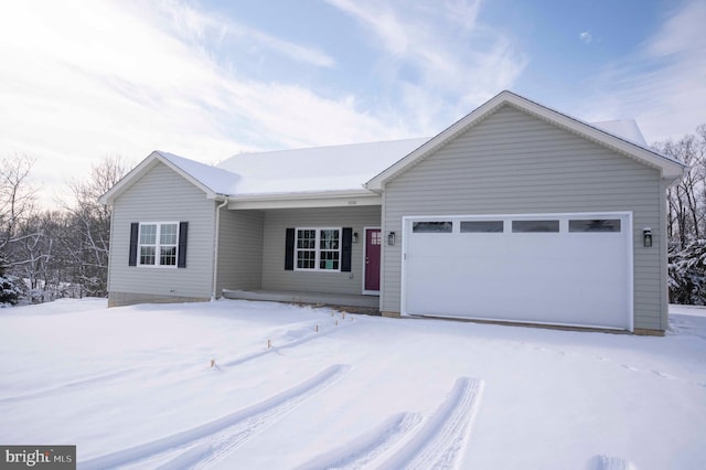 ranch-style house featuring a garage