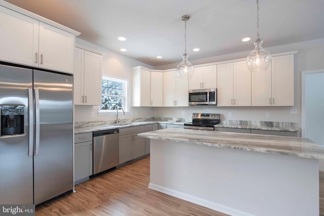 kitchen with white cabinets and stainless steel appliances