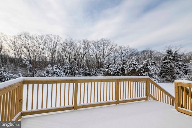 view of snow covered deck