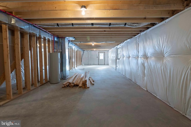 basement featuring electric water heater