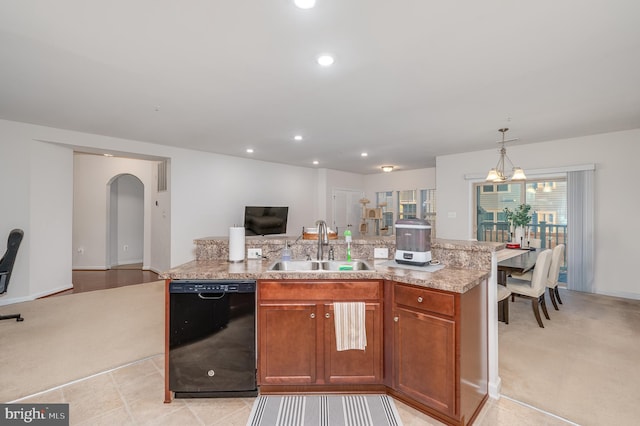 kitchen with sink, a center island with sink, a notable chandelier, dishwasher, and hanging light fixtures