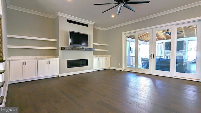 unfurnished living room featuring built in shelves, ceiling fan, french doors, and dark hardwood / wood-style floors