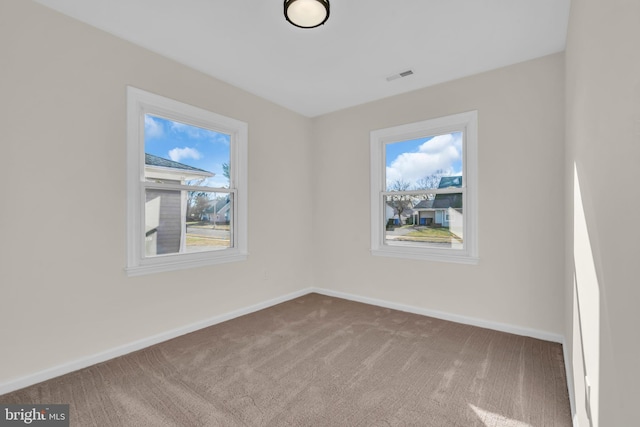 view of carpeted spare room