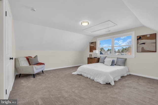 carpeted bedroom featuring lofted ceiling