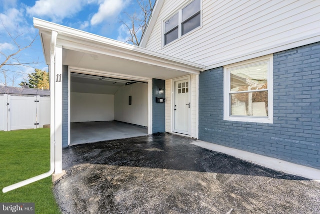 exterior space featuring a carport