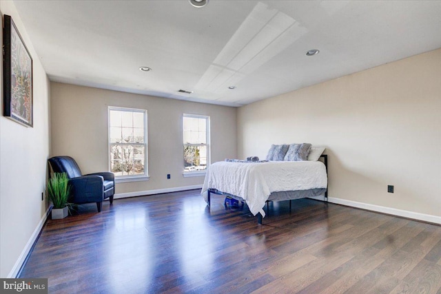 bedroom featuring dark hardwood / wood-style floors