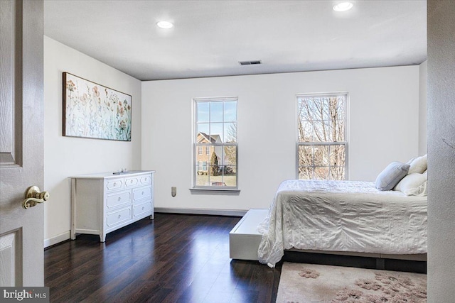 bedroom featuring dark wood-type flooring