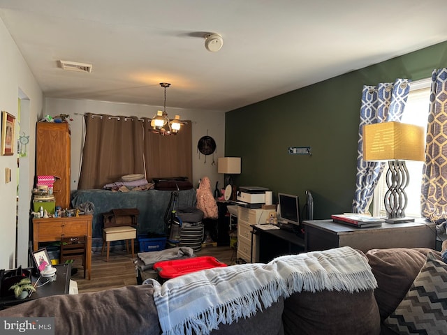 living room featuring a notable chandelier