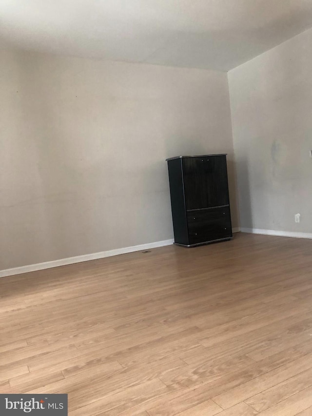 empty room featuring light hardwood / wood-style floors