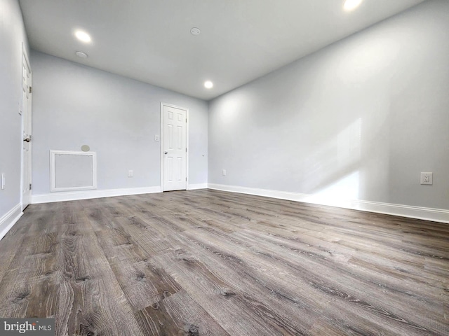 empty room featuring hardwood / wood-style flooring