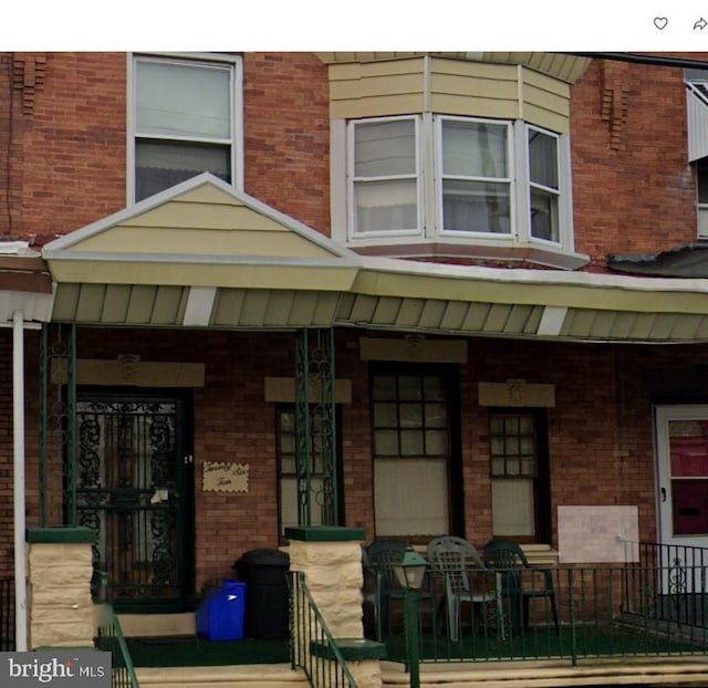 exterior space featuring covered porch