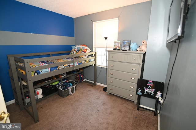 bedroom featuring carpet