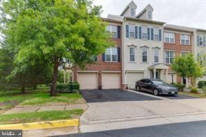 view of property featuring a garage