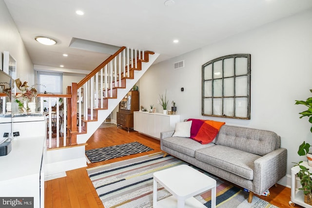 living room with wood-type flooring