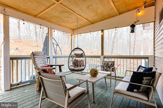 sunroom / solarium with wood ceiling