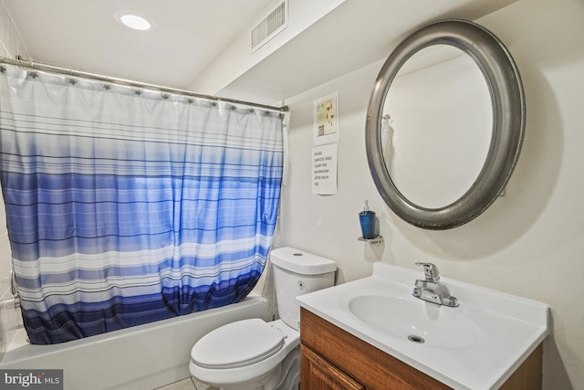 full bathroom with vanity, toilet, and shower / bath combo