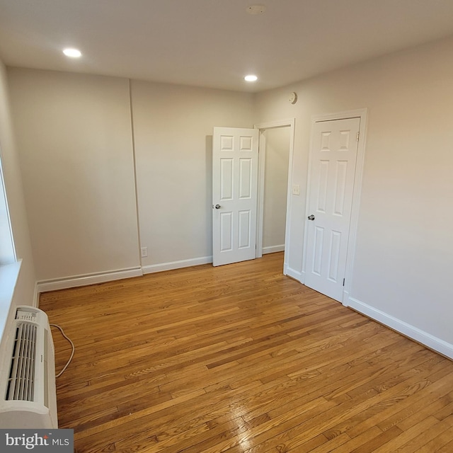 empty room with light wood-type flooring