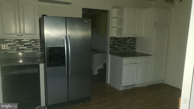 kitchen with stainless steel refrigerator with ice dispenser, black dishwasher, tasteful backsplash, and white cabinetry