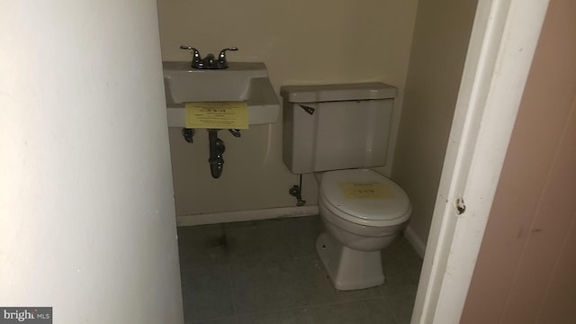 bathroom featuring toilet