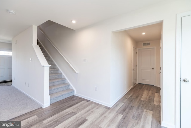 hallway featuring light hardwood / wood-style floors