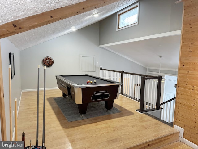 playroom with lofted ceiling, billiards, a textured ceiling, and light hardwood / wood-style flooring