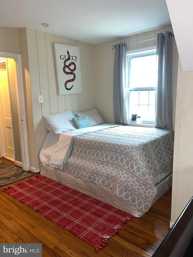 bedroom featuring hardwood / wood-style flooring