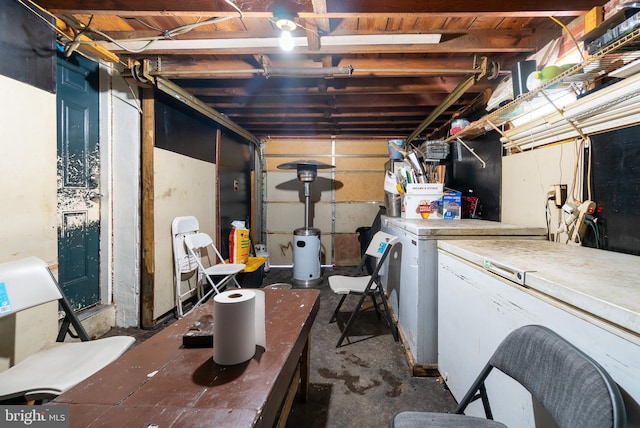 basement with washer and clothes dryer