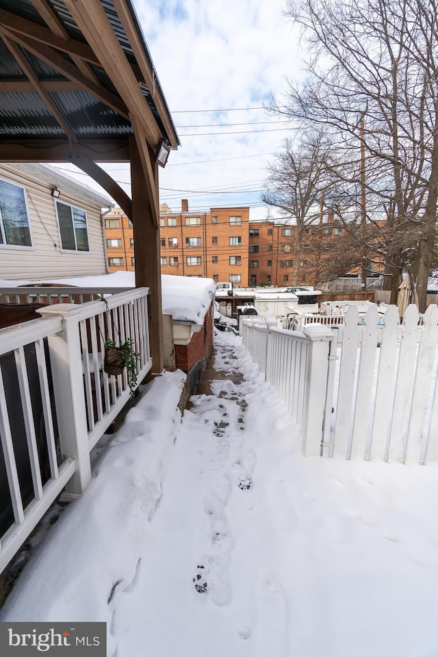 view of yard covered in snow