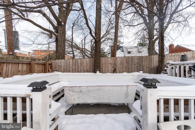 view of yard layered in snow