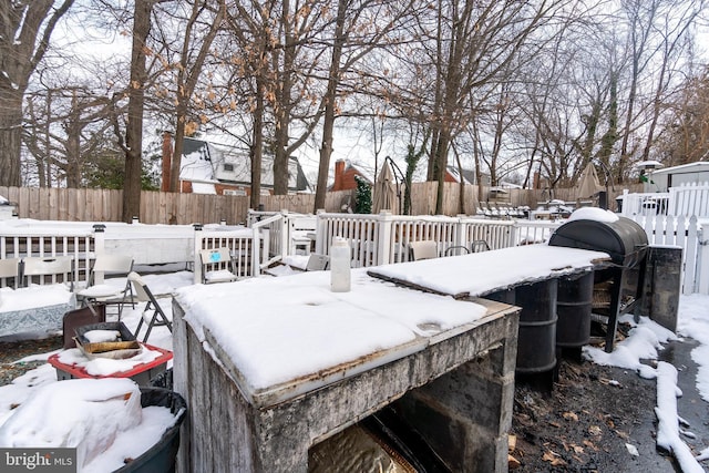 view of snow covered deck