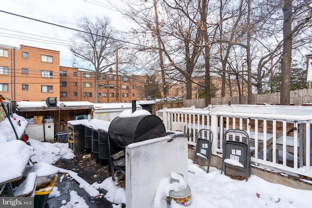 view of snow covered deck