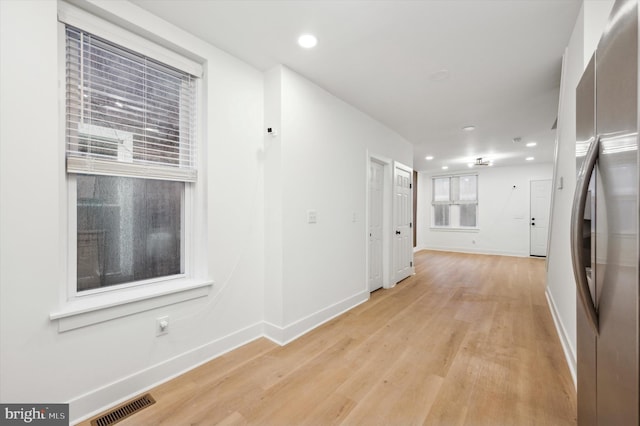 hall featuring light wood-type flooring