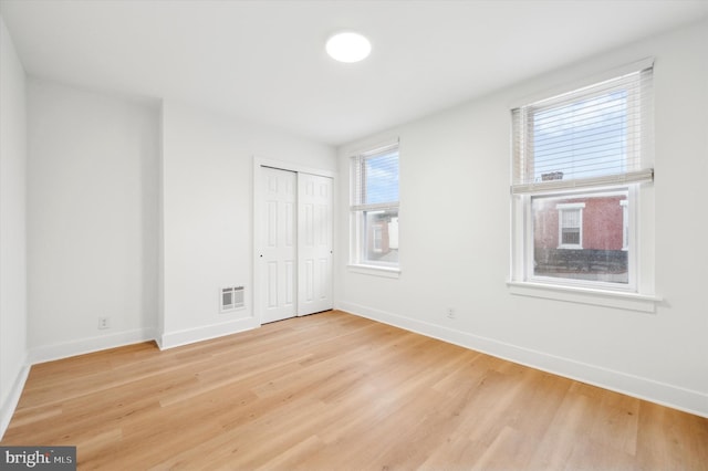 unfurnished bedroom featuring light hardwood / wood-style floors