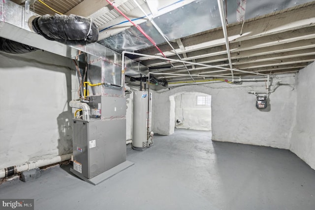 basement with heating unit and gas water heater