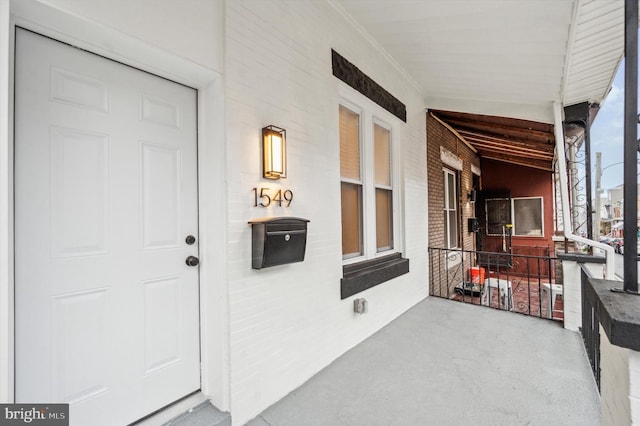 property entrance with a porch