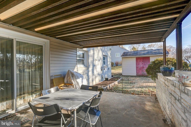 view of patio / terrace with a storage unit