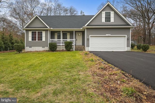 view of front of home with a front lawn, a porch, and a garage