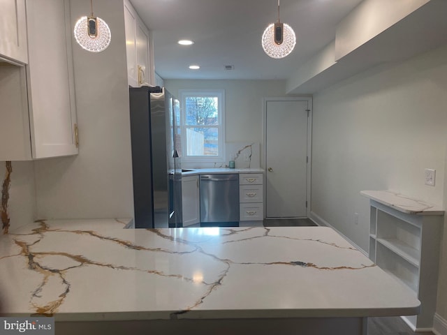 kitchen featuring white cabinets, hanging light fixtures, light stone counters, kitchen peninsula, and stainless steel appliances