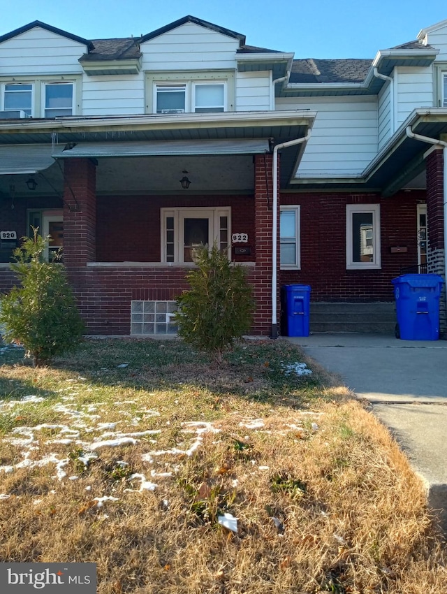 multi unit property featuring a porch