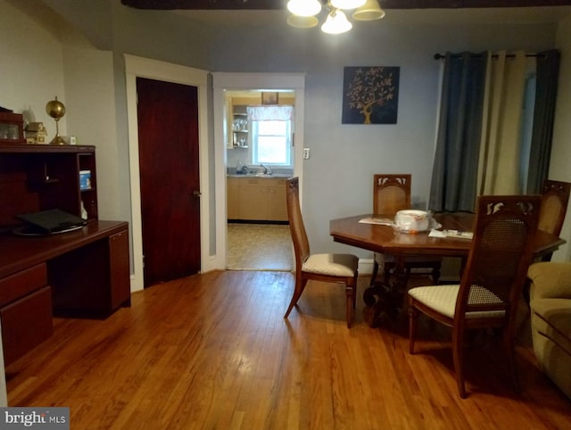 dining area featuring light wood-type flooring