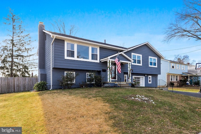 view of front of house with a front lawn