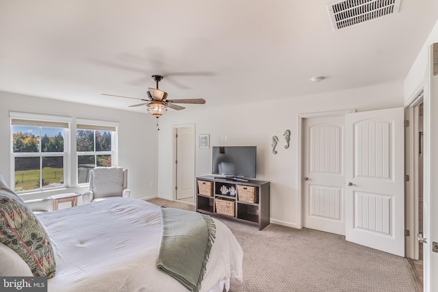 carpeted bedroom featuring ceiling fan