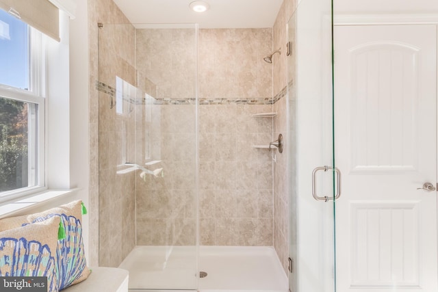 bathroom with an enclosed shower