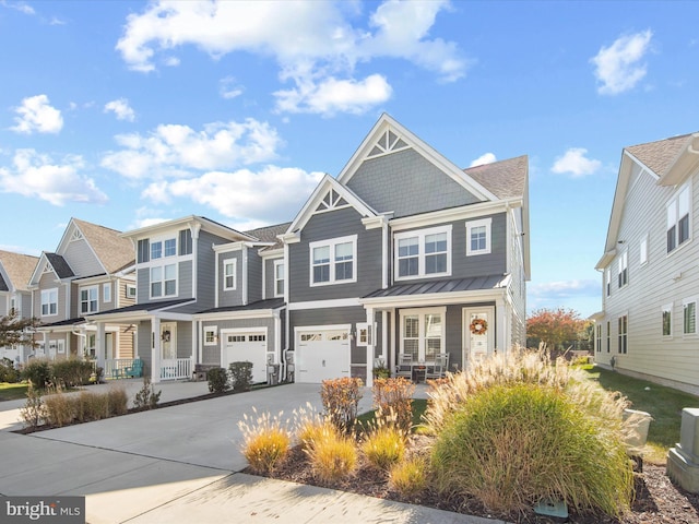 view of front of home featuring a garage and covered porch