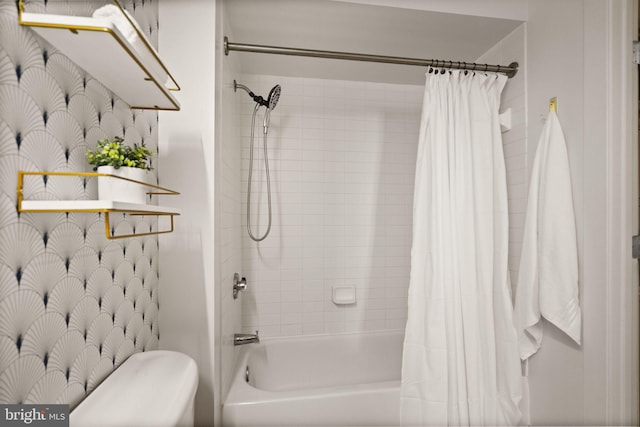 bathroom with shower / bath combination with curtain