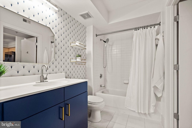 full bathroom with tile patterned flooring, vanity, shower / bath combination with curtain, and toilet