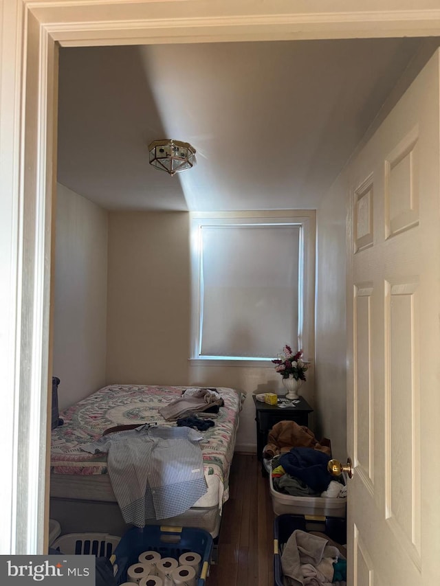 bedroom featuring wood-type flooring