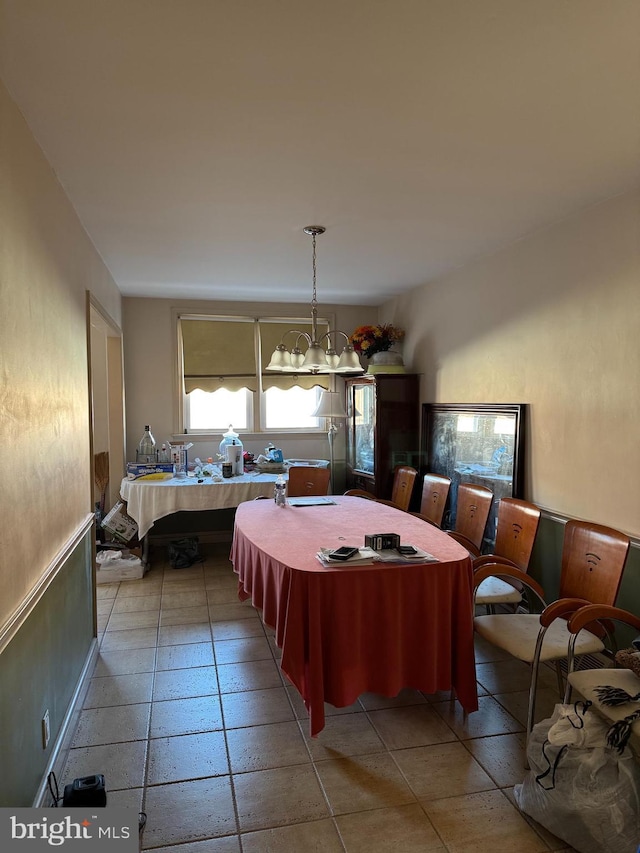 dining room featuring a notable chandelier